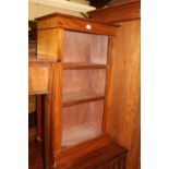 A small walnut freestanding low open bookshelf, w.51.5cm
