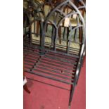 A Gothic style painted wrought iron arch backed three-seater garden bench, w.121.5cm