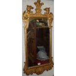 A George II style gilt gesso framed marginal wall mirror, having Prince of Wales feathers flanked by