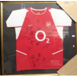 Arsenal interest - signed First Team shirt circa 2004/5 in glazed frame, frame dimensions