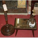 An Eastern carved camphor wood standard lamp; together with a matching low occasional table; and a