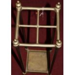 A late Victorian polished brass square four division stick stand, height 66.5cm