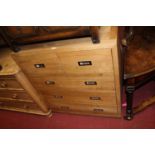 A contemporary faded light oak squarefront chest, of two short over three long drawers, w.86.5cm