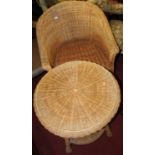A pair of contemporary wicker tub conservatory chairs; together with a matching circular two-tier