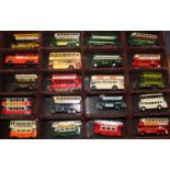 Two wall mounted displays of Matchbox trams, buses, commercial vehicles etc