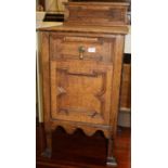 A circa 1900 geometric moulded oak ledgeback coal purdonium, with hinged compartment, w.41.5cm