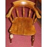 A circa 1900 elm fruitwood and beech captain's chairCondition report: Chair sits strong. Colour is