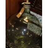 A large green glass carboy, h.54cm