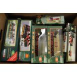 A box containing a quantity of Corgi Classics Eddie Stobart vehicles