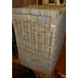 A large wicker hinge top laundry basket, width 90cm
