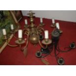 A Dutch style lacquered brass eight-light ceiling pendant; and one other metal example (2)