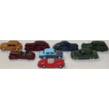 One box containing eight various Dinky Toys including a Ford Sedan, Hillman Minx x2, etc
