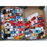 Two trays containing a quantity of mixed modern release diecasts to include a Bburago Majorette,