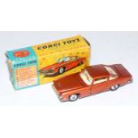 A Corgi Toys No. 241 Ghia L.6.4 with Chrysler engine, comprising of metallic orange/bronze body with