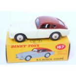 A Dinky Toys No. 167 AC Aceca Coupe, comprising of cream body with brown roof and dark cream rigid