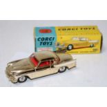 A Corgi Toys No. 211S Studebaker Golden Hawk comprising of gold body with white side flash, spun