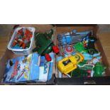 Two trays containing a quantity of Thunderbirds related action figures, vehicles and accessories,