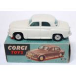 A Corgi Toys No. 204 Rover 90 saloon comprising of light grey body with spun hubs and windows housed