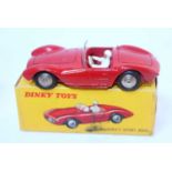 A French Dinky Toys No. 22A Maserati Sport 2000 race car comprising of red body with spun hubs and