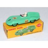 A Dinky Toys No. 236 Connaught Racing car comprising of light green body with green hubs, racing
