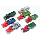 Seven various loose Triang Minic tinplate and clockwork delivery vehicles, to include Minic