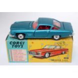 A Corgi Toys No. 241 Ghia L.6.4 saloon comprising of dark metallic blue body with red interior and