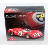 A GMP Model No. G1804101 1/18 scale limited edition model of a Ferrari 330 P4, finished in red
