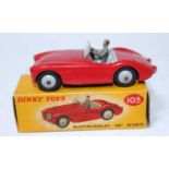 A Dinky Toys No. 103 Austin Healey 100 sports saloon comprising of red body with grey interior and