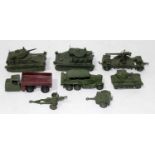 A collection of various loose Dinky Toy military diecasts to include a light tank, a medium tank,