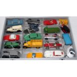 An interesting selection of various diecast and lead hollow cast vehicles and accessories to include