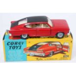 A Corgi Toys No. 263 Marlin Rambler Sports Fast Back comprising of red body with black roof, cast