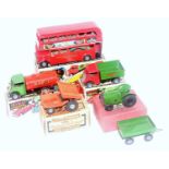 A Triang Minic boxed tinplate and clockwork vehicle group to include a Minic tractor and trailer,