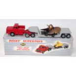 A Dinky Toys No. 986 Mighty Antar low loader with propeller, comprising of red tractor unit with