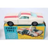 A Corgi Toys No. 325 Ford Mustang Fast Back 2+2 Competition Race Model comprising of white body with