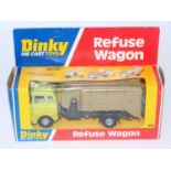 A Dinky Toys No. 978 refuse wagon comprising of light green cab with black chassis and grey back,