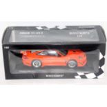 A Minichamps Model No. 108901 1/18 scale model of a Porsche 911 GT3R finished in orange (street