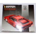 A Pocher kit No. K51 boxed 1/8 scale plastic, white metal and leather kit for a Ferrari Testarossa