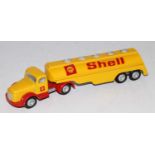 A Tekno No. 434 Shell Volvo articulated tractor unit and trailer comprising of red and yellow body
