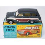 A Corgi Toys No. 491 Ford Consul Cortina Super estate comprising of metallic dark grey body with