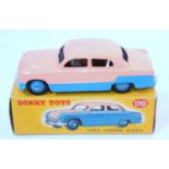 A Dinky Toys No. 170 Ford Fordor Sedan comprising of two tone pink and blue body with blue hubs,