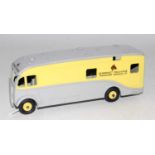 A Dinky Toys Newmarket Race Course Transport Service horsebox comprising of lemon and grey body with