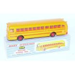 A Dinky Toys No. 949 Wayne School Bus comprising of yellow and red body with red plastic hubs and