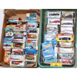 Two trays containing a large quantity of various mixed modern release diecast to include Welly,