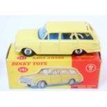 A Dinky Toys No. 141 Vauxhall Victor estate car comprising of lemon yellow body with blue interior