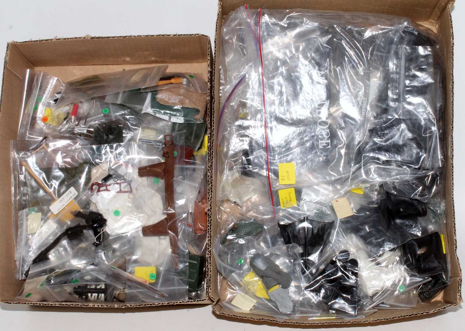 Three boxes containing a large quantity of various mixed loose Action Man accessories, to include