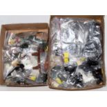 Three boxes containing a large quantity of various mixed loose Action Man accessories, to include