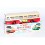A French Dinky Toys No. 889 Parisian Urban Autobus comprising of red and cream body with Dunlop