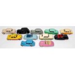 Eleven various loose repainted and playworn Dinky Toy diecast toy vehicles and accessories, to