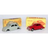 A Lion Toys No. 1053 model of a type D KW 1958 saloon, finished in maroon with grey hubs and