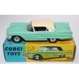 A Corgi Toys No. 214 Ford Thunderbird comprising of pale green body with cream roof and spun hubs